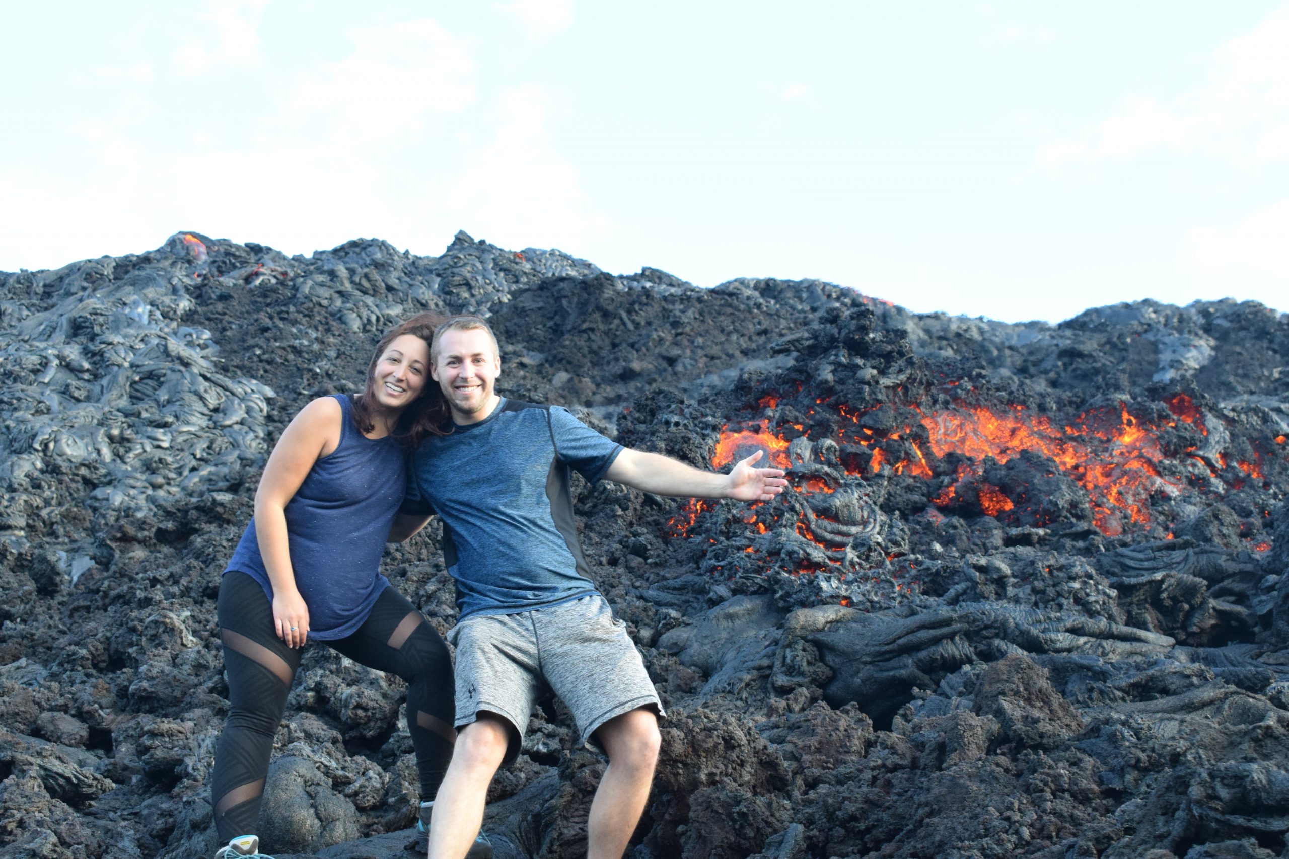 Couple standing near Lava on Hawaii Volcano