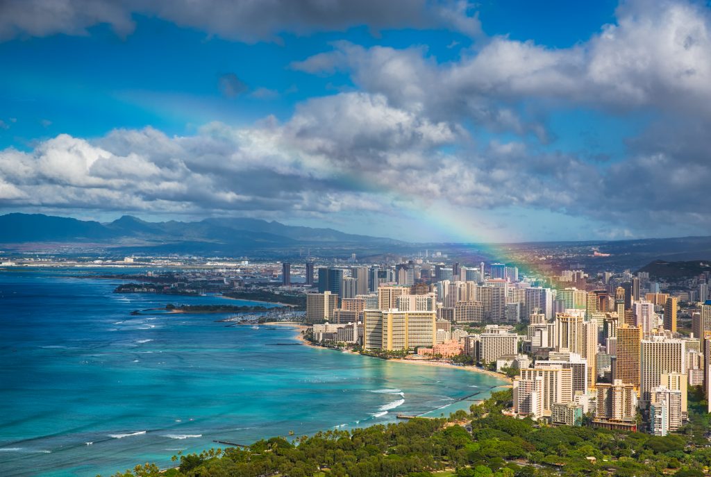 Rainbow over Hawaii Skyline and turquoise waters