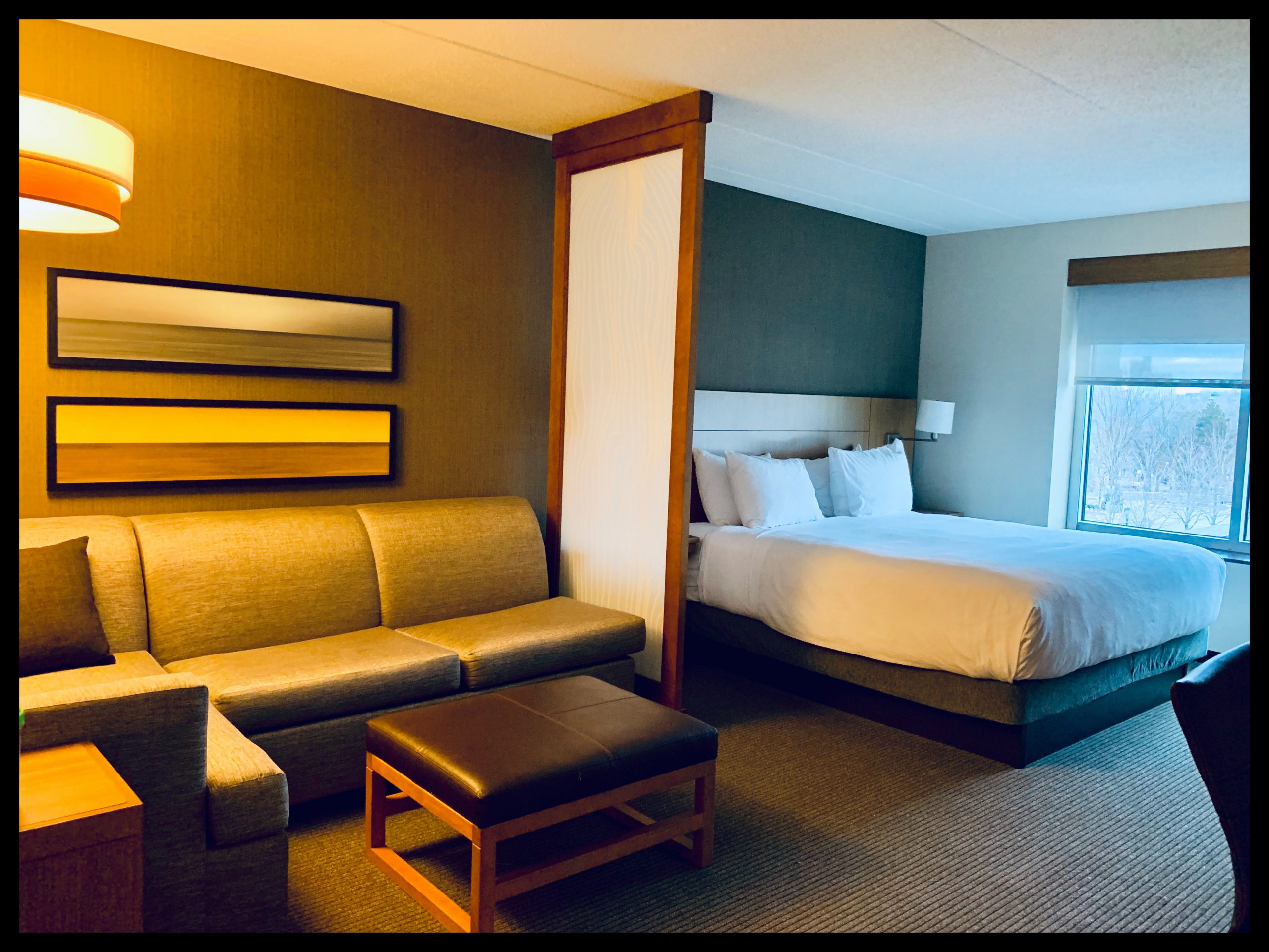 Hotel room with King size bed and couch/seating area