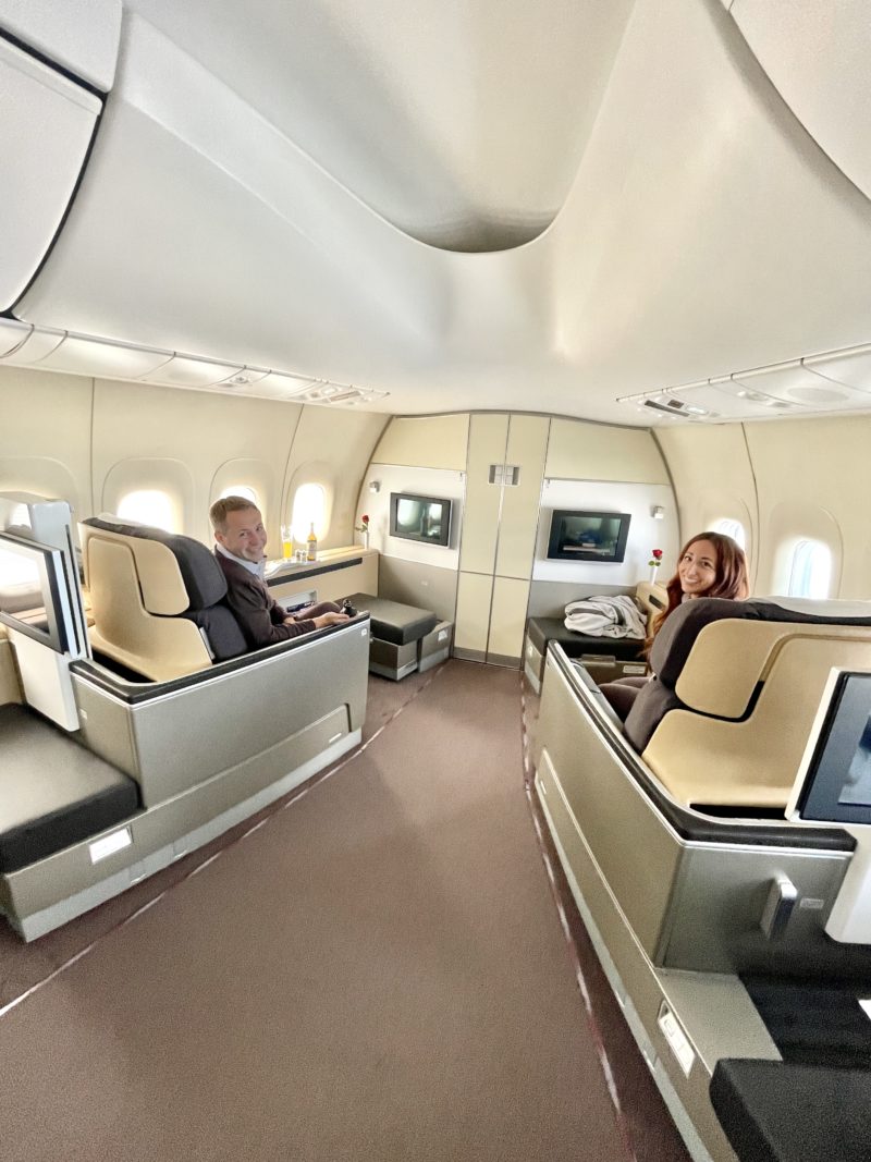 Couple sitting in first class on Lufthansa Flight