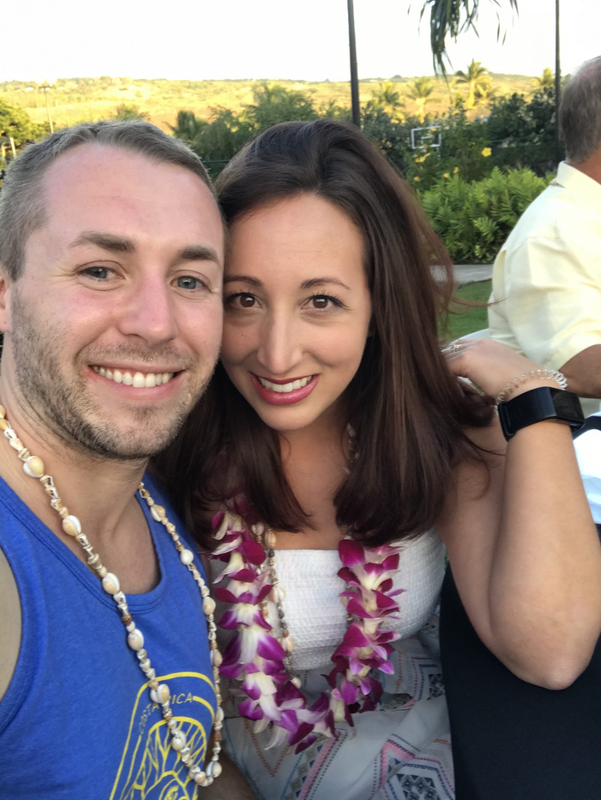 Boy and Girl smiling with Lei's on from Hawaii