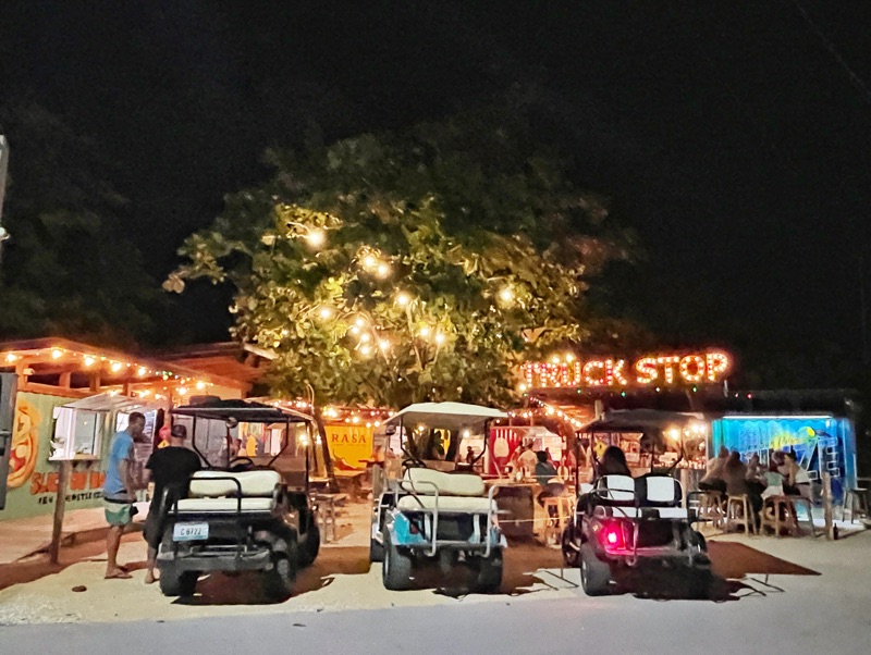 The Truck Stop with 3 golf carts outside