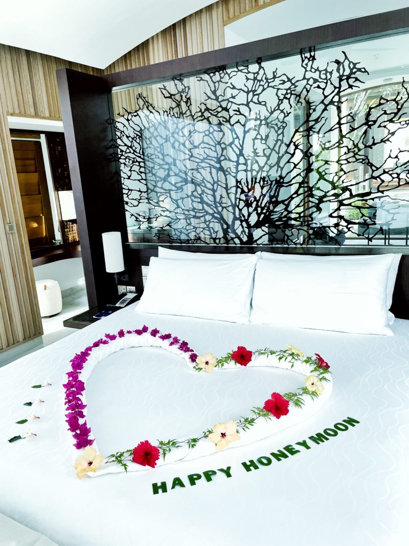 Heart honeymoon decoration on bed