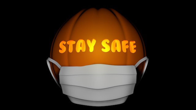 Stay Safe Halloween pumpkin with mask on 