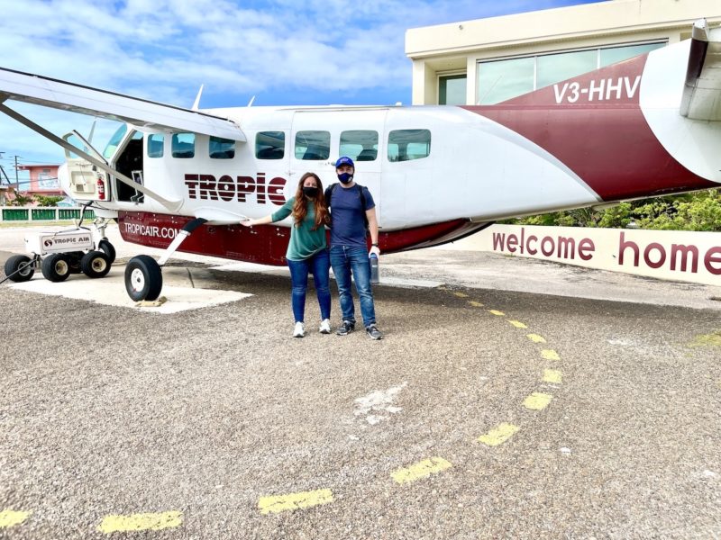 Couple standing in front of Tropic Airplane