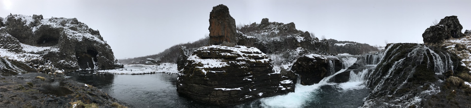 Panaromic view of snow covered waterfalls in Iceland